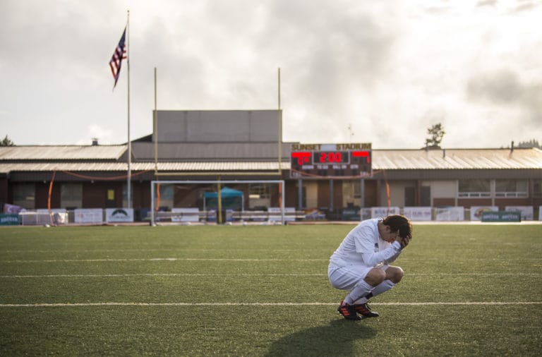 Sehome's Dylan Cox pauses for a moment before walking off the field following Sehome's victory over Columbia River during the WIAA 2A Championship title game at Sumner High School on Saturday afternoon, May 25, 2019. "I'm a senior, this could be my last time on the field. It's just surreal to end it like this," Cox said.