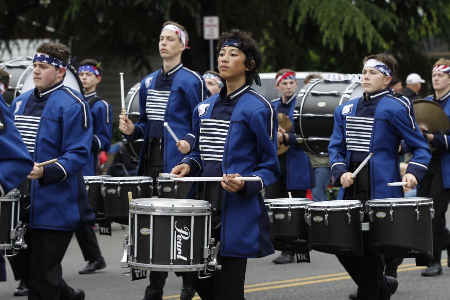 The Skyview high school band marches in a recent Hazel Dell Parade of Bands. The parade usually draws thousands of participants and tens of thousands of spectators.