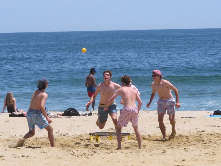 Beachgoers play spikeball on the sand in Belmar, N.J., in May 2018. On Friday, Gov. Phil Murphy signed a law protecting the public’s right to access and use the state’s waterways and adjacent shorelines.