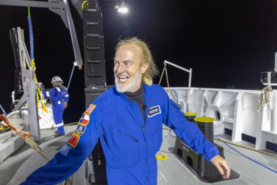 Victor Vescovo emerges from his submersible Limiting Factor after a successful dive to the deepest known point in the Mariana Trench on April 28. Vescovo, a businessman and amateur pilot, has also traversed the highest peaks of mountains, including Mount Everest.