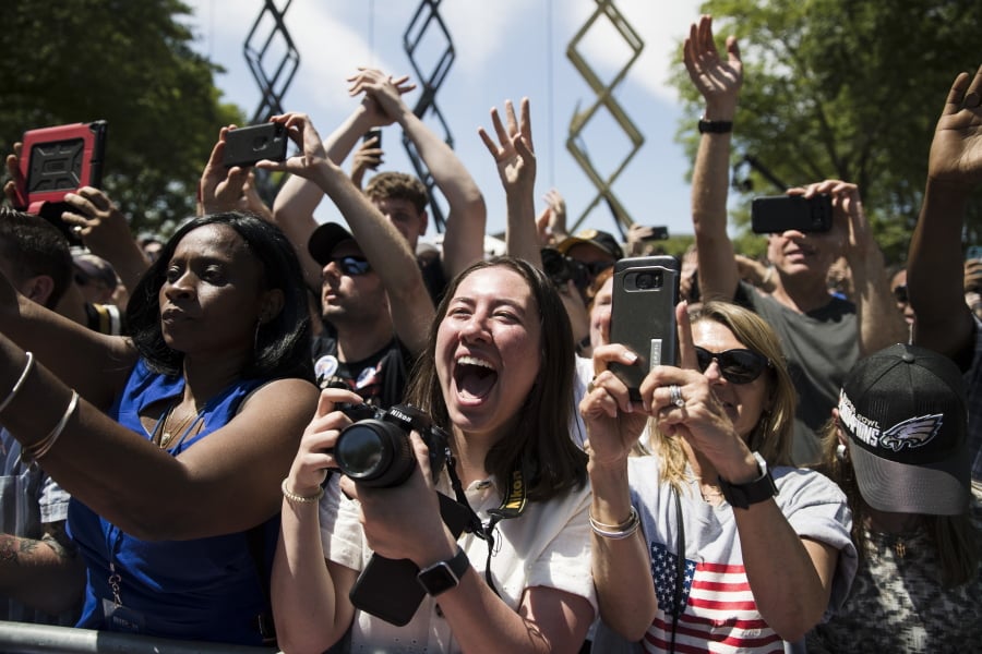 Attendees cheer as Democratic presidential candidate, former Vice President Joe Biden arrives at a campaign rally at Eakins Oval in Philadelphia, Saturday, May 18, 2019.