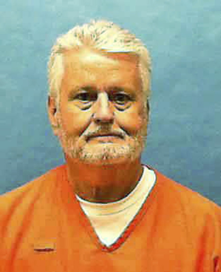 In this updated photo made available by the Florida Department of Law Enforcement shows Bobby Joe Long in custody. Long, is scheduled to be executed Thursday, May 23, 2019, for killing 10 women during eight months in 1984 that terrorized the Tampa Bay area. He was sentenced to 401 years in prison, 28 life sentences and one death sentence. His execution is for the murder of 22-year-old Michelle Simms.