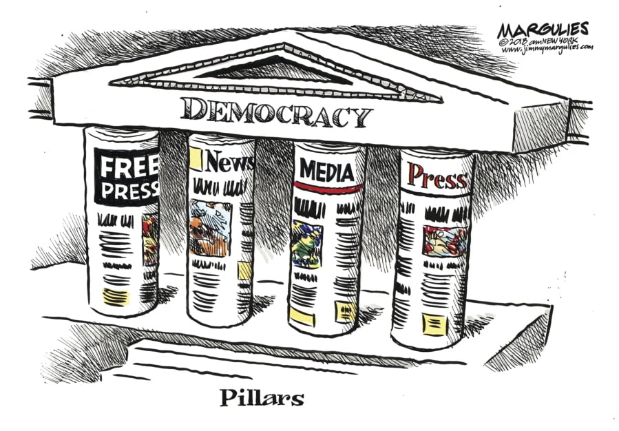 This image provided by Jimmy Margulies shows “Pillars,” by King Features editorial cartoonist Jimmy Margulies, that is one of dozens of political cartoons focusing on the First Amendment in a new exhibit, “Front Line: Editorial Cartoonists and the First Amendment” at Ohio State University’s Billy Ireland Cartoon Library & Museum in Columbus, Ohio. The display runs the gamut from a 1774 cartoon by Paul Revere criticizing Britain’s use of tea as a political weapon to a 2018 cartoon lampooning the blocking of online conservative commentary.