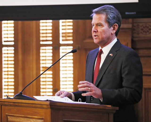 In this Wednesday, Jan. 23, 2019, file photo, Georgia Gov. Brian Kemp addresses the 2019 Season Joint Budget hearings, in Atlanta. Kemp is set to sign legislation on Tuesday, May 7, 2019, banning abortions at around six weeks of pregnancy, before many women know they’re pregnant.