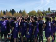 The Columbia River boys soccer team gathers after beating W.F. West 7-0 on Saturday in the first round of the 2A district tournament at Columbia River High.