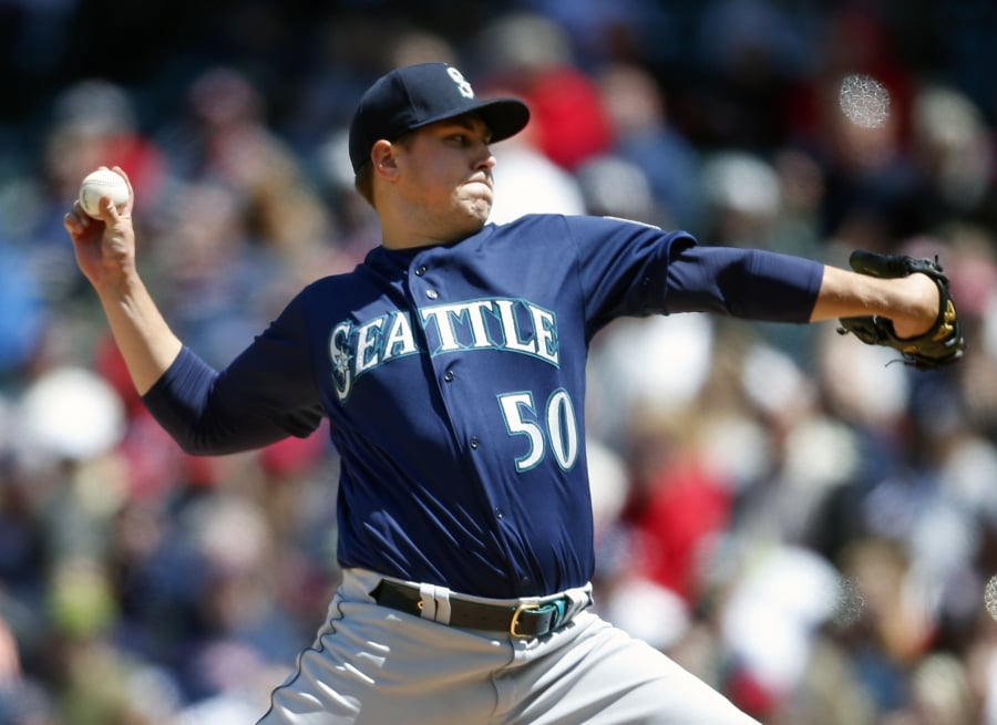 Seattle Mariners starting pitcher Erik Swanson delivers against the Cleveland Indians during the first inning of a baseball game, Sunday, May 5, 2019, in Cleveland.