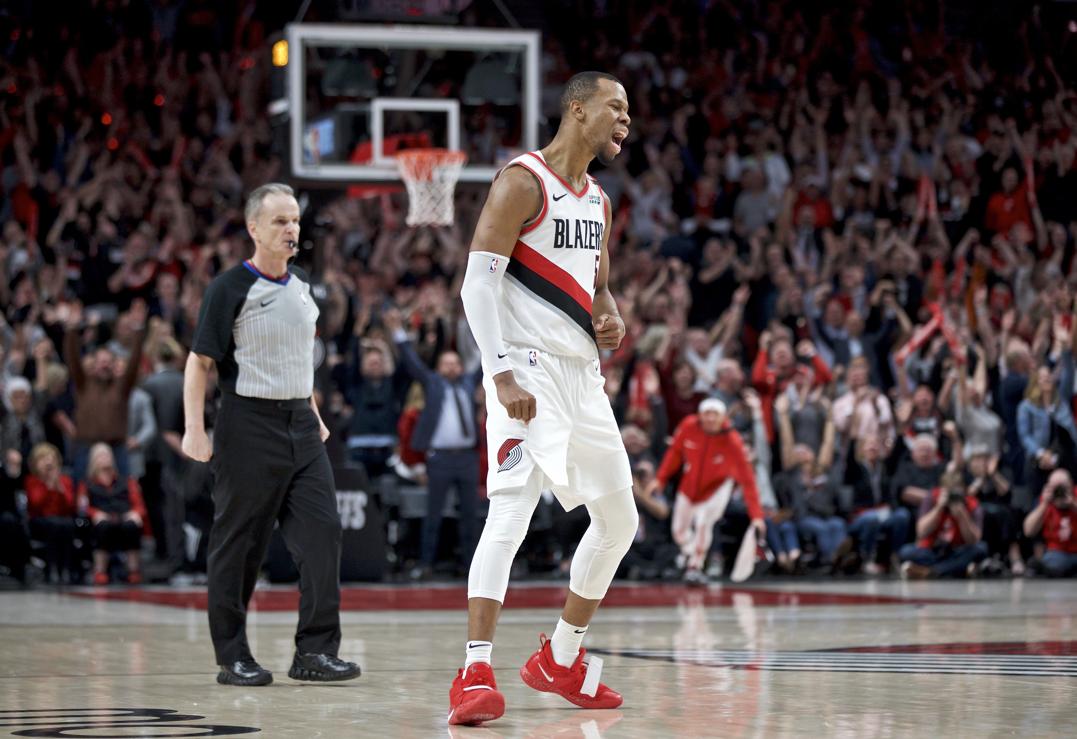 Portland Trail Blazers guard Rodney Hood reacts after making a three point basket against the Denver Nuggets during the fourth overtime of Game 3 of an NBA basketball second-round playoff series Friday, May 3, 2019, in Portland, Ore.
