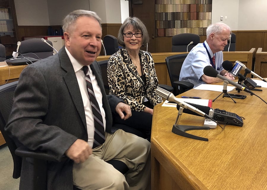 FILE - In this Jan. 18, 2019 file photo, Oregon Senate Republican Leader Herman Baertschiger, Jr., left, Senate Democratic Leader Ginny Burdick and Senate President Peter Courtney speak to the media at the State Capitol in Salem, Ore. Baertschiger told reporters Monday, May 6, 2019 that Senate Republicans in Oregon have fled Salem to avoid a Tuesday vote on a $1 billion per-year funding package for schools. They oppose the proposed half a percent tax on businesses with sales over $1 million.