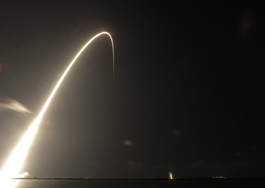 A Falcon 9 SpaceX rocket, with a payload of 60 satellites for SpaceX’s Starlink broadband network, lifts off from Space Launch Complex 40 during a time exposure at the Cape Canaveral Air Force Station in Cape Canaveral, Fla., Thursday, May 23, 2019.