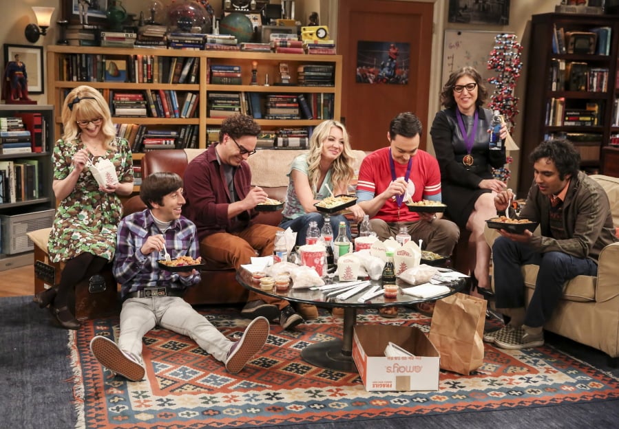 This photo provided by CBS shows Melissa Rauch, from left, Simon Helberg, Johnny Galecki, Kaley Cuoco, Jim Parsons, Mayim Bialik and Kunal Nayyar in a scene from the series finale of “The Big Bang Theory,” Thursday, May 16, 2019, airing 8:30 - 9:00 p.m., ET/PT, on the CBS Television Network.