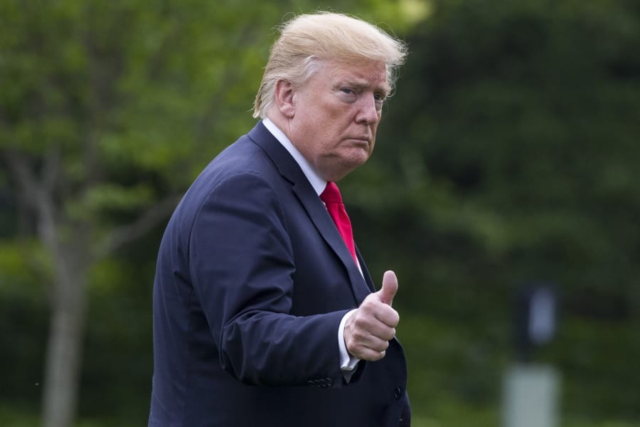 President Donald Trump gives thumbs up after arriving on Marine One on the South Lawn of the White House, Friday, May 17, 2019, in Washington. Trump is returning from a trip to New York.