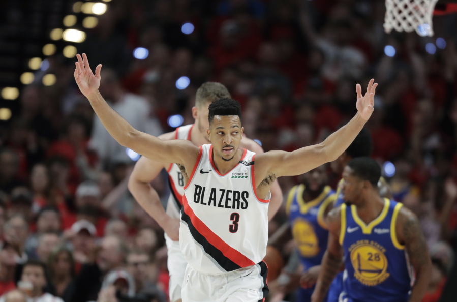 Portland Trail Blazers guard CJ McCollum (3) reacts after a play against the Golden State Warriors during the first half of Game 4 of the NBA basketball playoffs Western Conference finals, Monday, May 20, 2019, in Portland, Ore. (AP Photo/Ted S.