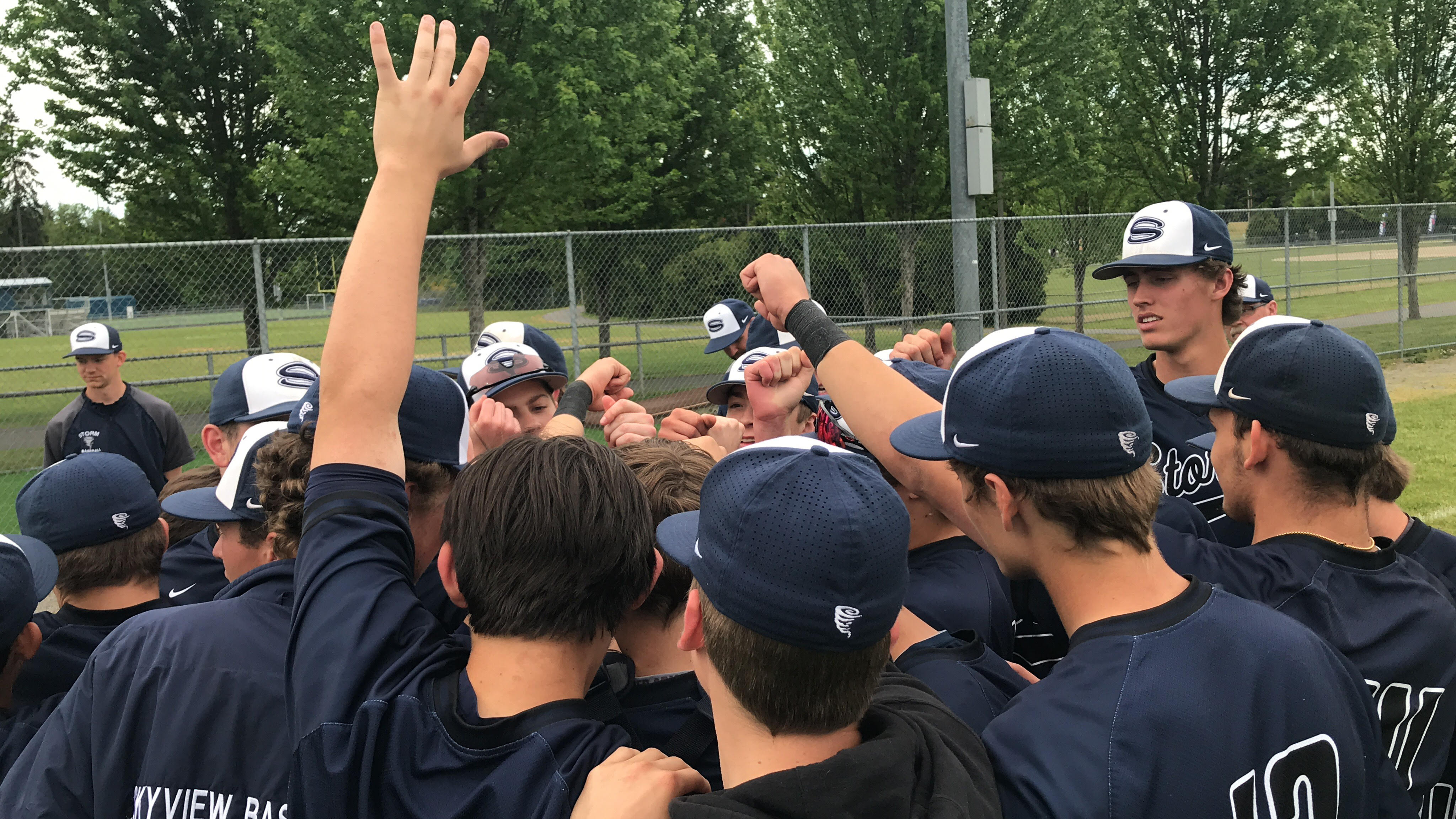 Skyview's baseball team celebrates its 1-0 regional-final win over Eastlake in Puyallup to advance to next week's state semifinals. The Storm won a pair of 1-0 games Saturday.
