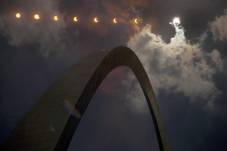 In this Aug. 21, 2017 multiple exposure photograph, the phases of a partial solar eclipse are seen over the Gateway Arch in St. Louis. Another total solar eclipse is happening July 2 in the Southern Hemisphere.