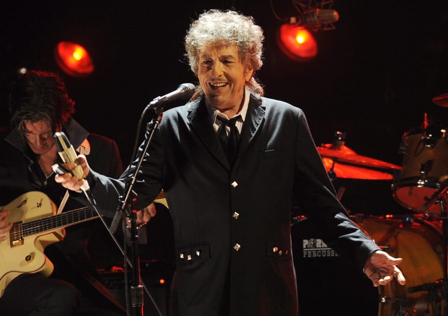 Bob Dylan performs in 2012 in Los Angeles. Dylan built his career singing and writing protest songs.