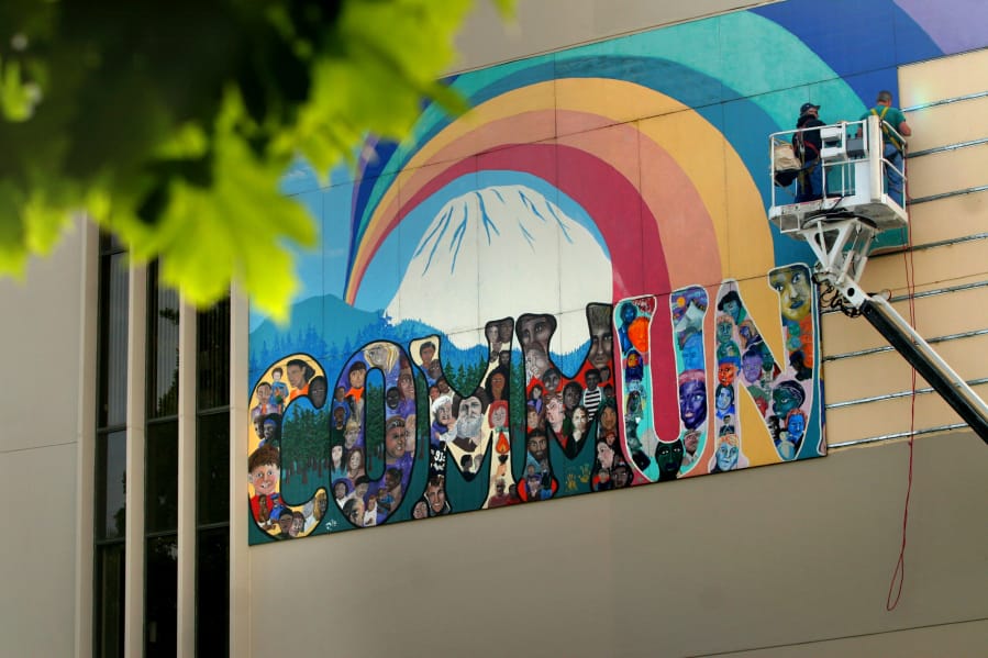 A crew from Vancouver Signs takes down the Rainbow Mural piece by piece in 2006 after weather damaged the art. The year before, Vancouver’s Cultural Commission had disbanded, leaving the city’s art scene without any stewardship or direction.