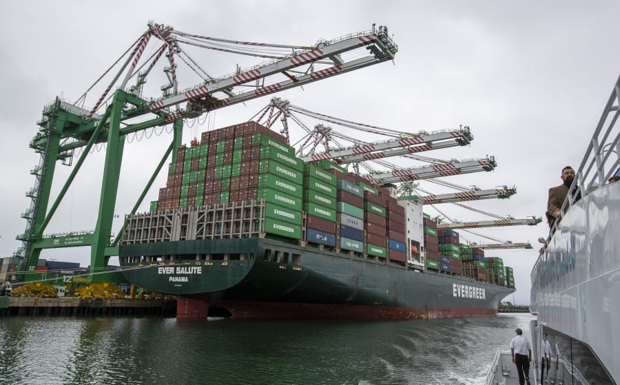 The Evergreen container ship Ever Salute is loaded with containers June 4 at the Port of Los Angeles. With 200,000 cargo owners shipping goods in and out of the port, tariffs on Chinese imports and China’s retaliatory tariffs on U.S. exports have “gummed up” operations throughout the logistics supply chain, he said. Allen J.