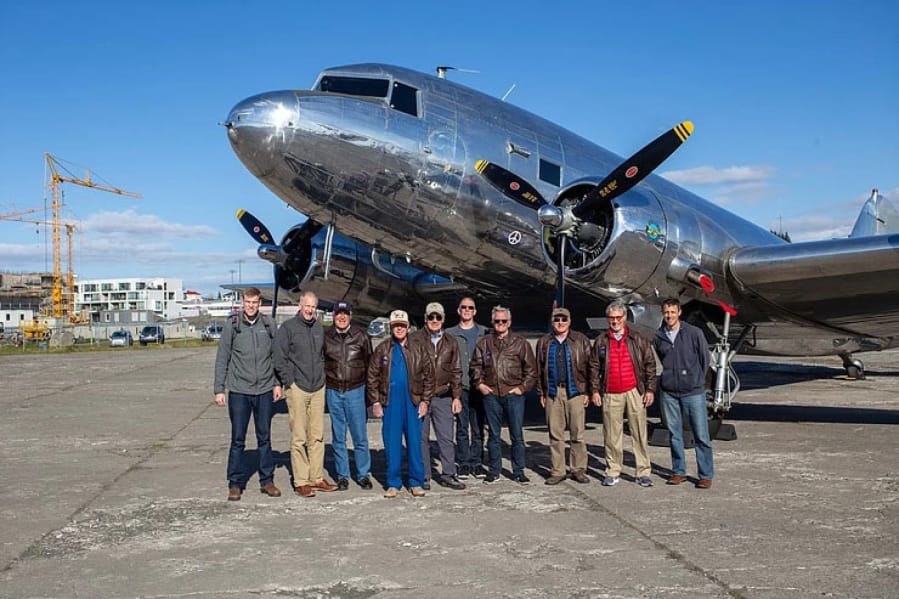 The 11 passengers on a trip from Aurora, Ore., to Normandy, France, in honor of the D-Day anniversary. Two Clark County residents were on the trip: Bob Irvine, fourth from left, and Jeff Petersen, sixth from left.