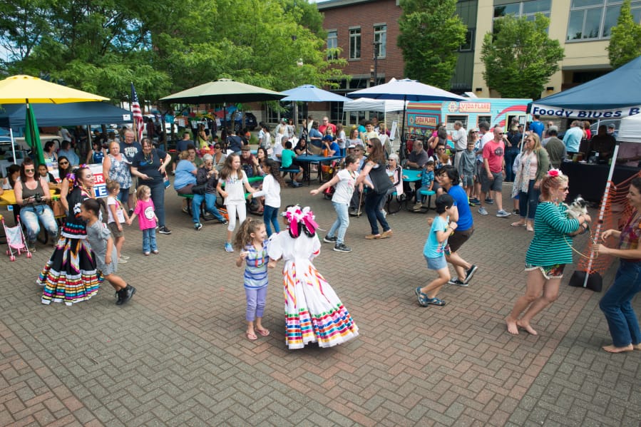 Dancers and vendors enjoy the inaugural Southwest Washington Tamale Festival in Washougal last June. This year, organizers have planned a day that’s stuffed with music, dance — and “plenty of tamales for everyone,” Hector Hinojosa said.