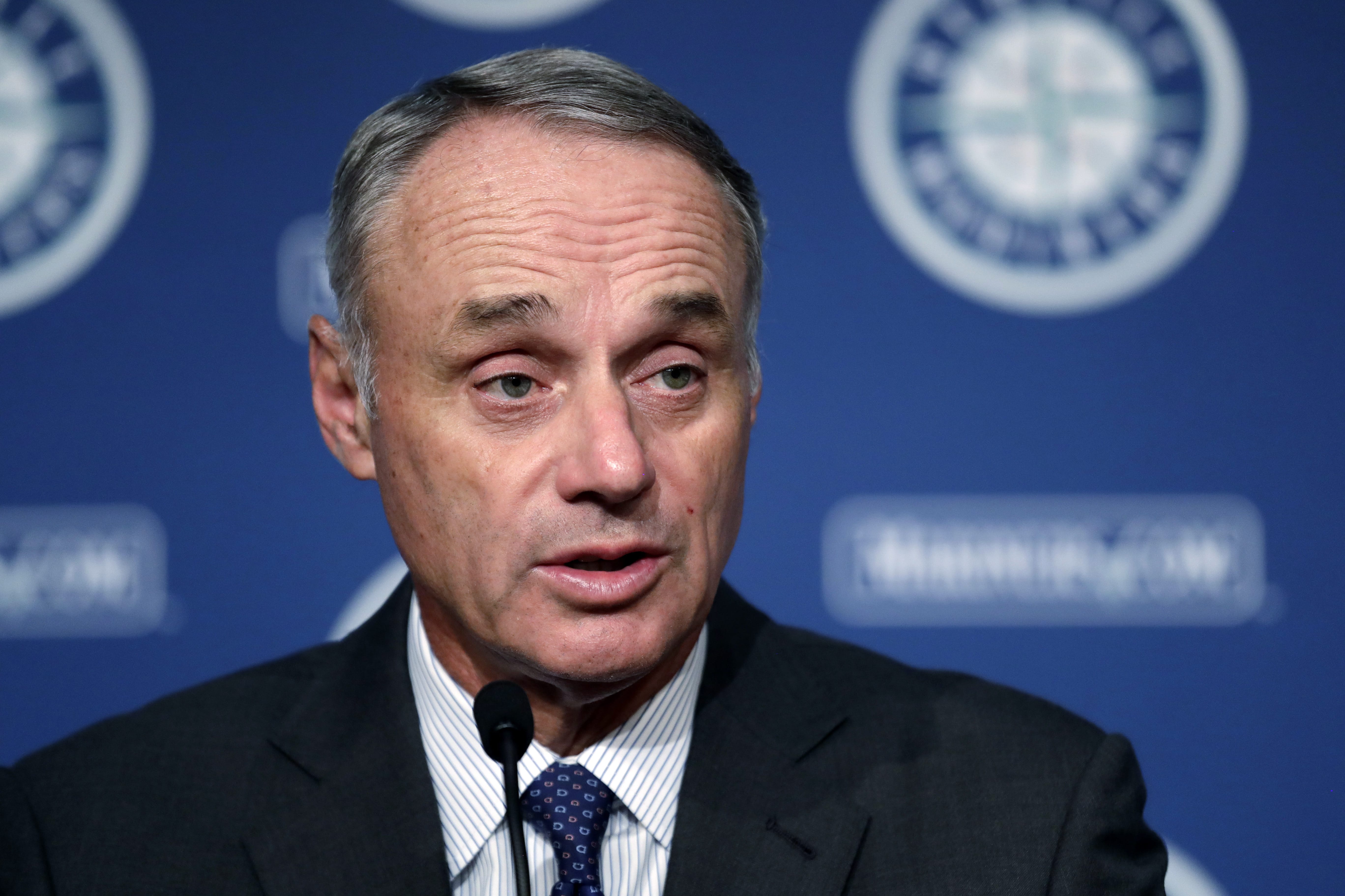 Baseball Commissioner Rob Manfred addresses reporters before a baseball game between the Seattle Mariners and the Houston Astros on Tuesday, June 4, 2019, in Seattle.