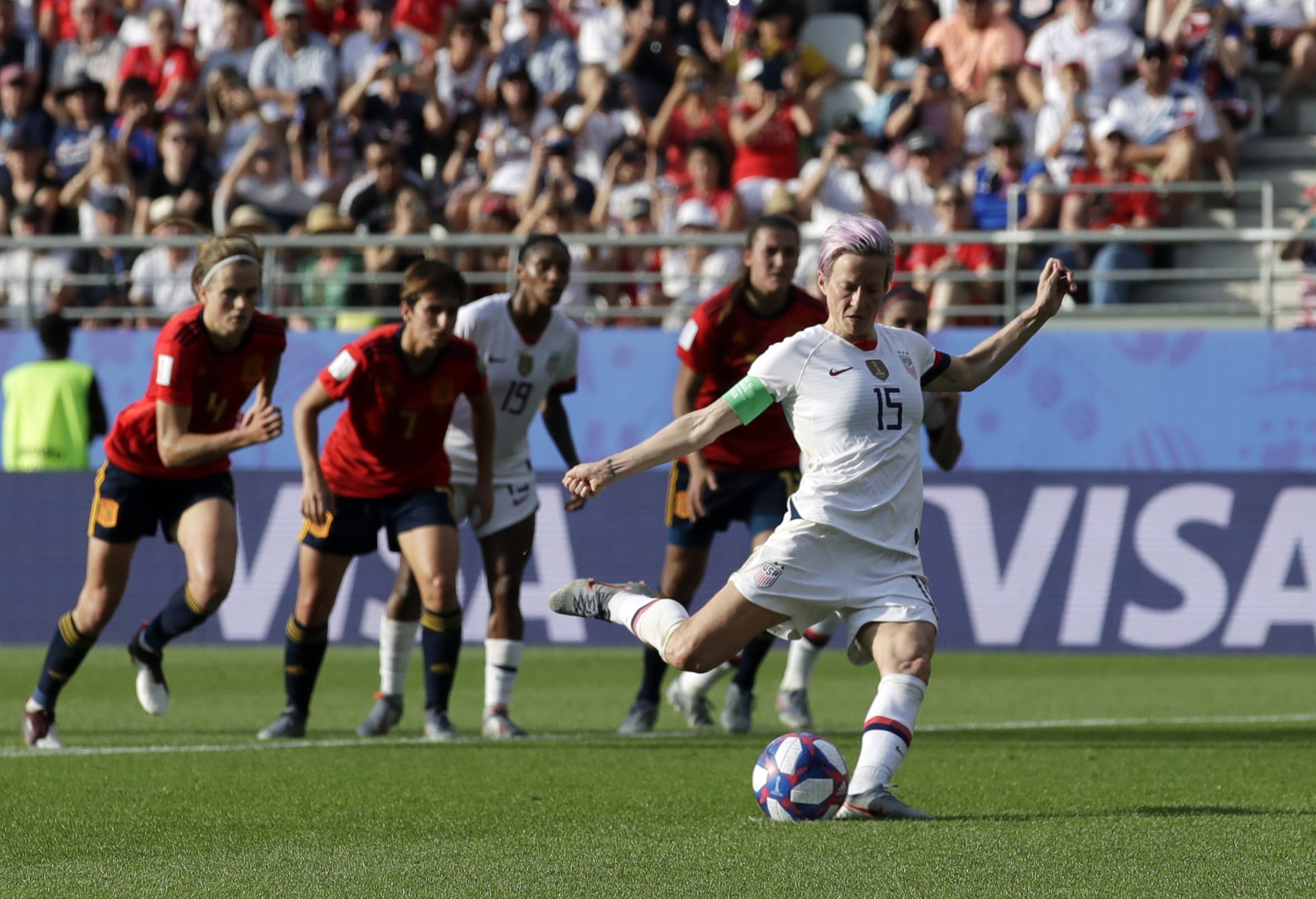United States'Megan Rapinoe scores her side's second goal from a penalty spot during the Women's World Cup round of 16 soccer match between Spain and US at the Stade Auguste-Delaune in Reims, France, Monday, June 24, 2019.