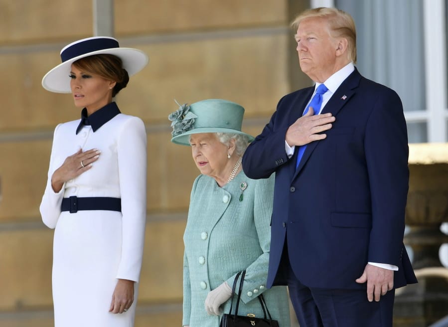 US President Donald Trump and first lady Melania Trump attend a welcome ceremony with Britain’s Queen Elizabeth II in the garden of Buckingham Palace, in London, for Monday June 3, 2019, on the first day of a three day state visit to Britain.