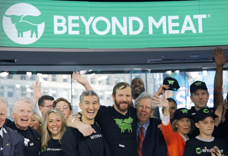 Ethan Brown, center, CEO of Beyond Meat, attends the Opening Bell ceremony with guests to celebrate the company’s IPO on May 2 at Nasdaq in New York.