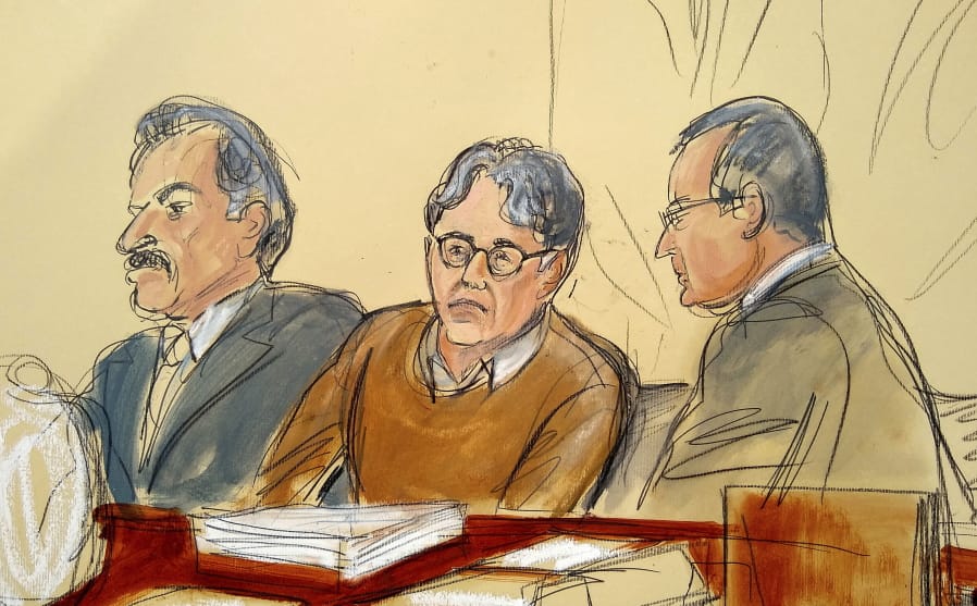 FILE - In this Tuesday, May 7, 2019 file courtroom drawing, defendant Keith Raniere, center, leader of the secretive group NXIVM, is seated between his attorneys Paul DerOhannesian, left, and Marc Agnifilo during the first day of his sex trafficking trial. After weeks of relentlessly lurid testimony, federal prosecutors have wrapped up their case against Raniere, a former self-improvement guru accused of sex trafficking. Both prosecutors and defense lawyers told the judge Friday, June 14 they were finished calling witnesses. Closing arguments and jury deliberations will happen next week.