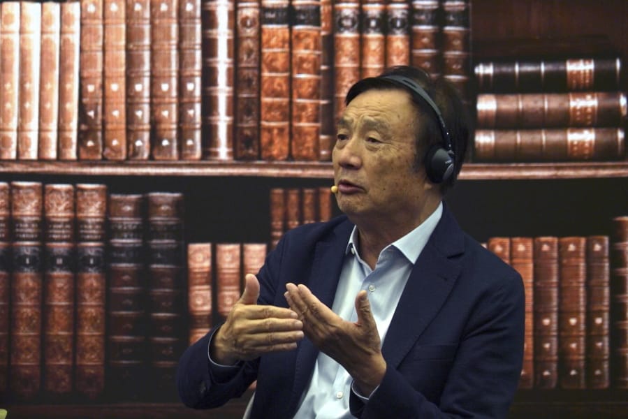 Huawei founder Ren Zhengfei speaks at a roundtable at the telecom giant’s headquarters in Shenzhen in southern China on Monday, June 17, 2019. Huawei’s founder has likened his company to a badly damaged plane and says revenues will be $30 billion less than forecast over the next two years.