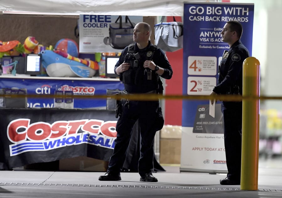 The Corona police department investigate a shooting inside a Costco on Friday in Corona, Calif.