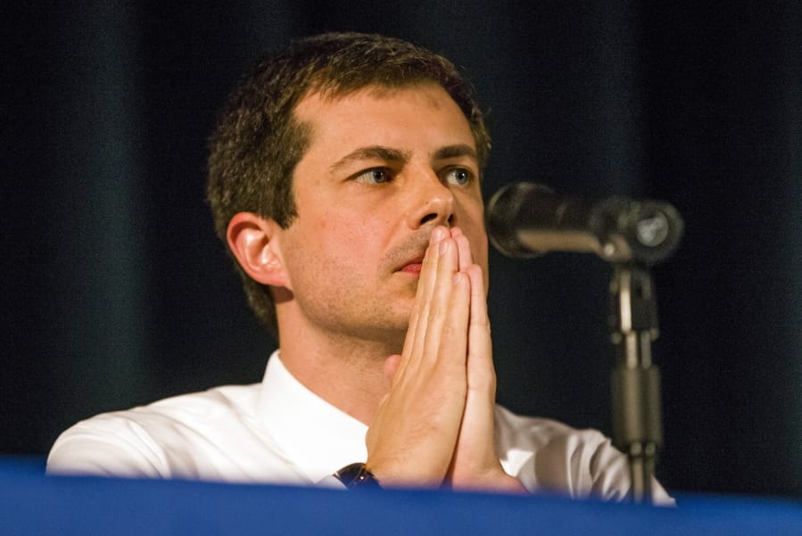 Democratic presidential candidate and South Bend Mayor Pete Buttigieg looks on during a town hall community meeting, Sunday, June 23, 2019, at Washington High School in South Bend, Ind. Buttigieg faced criticism from angry black residents at the emotional town hall meeting, a week after a white police officer fatally shot a black man in the city.