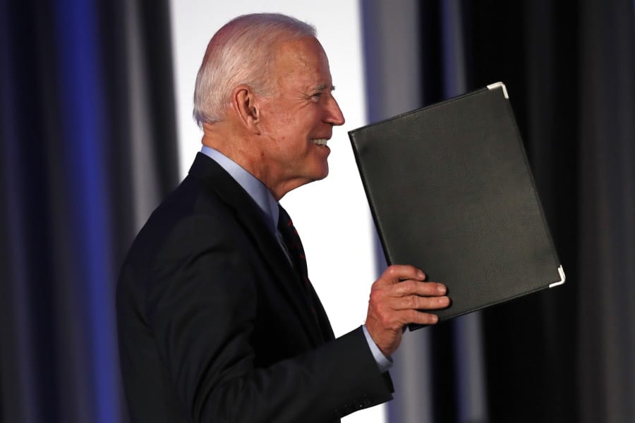 Democratic presidential candidate former Vice President Joe Biden gestures as he steps on stage before speaking during the I Will Vote Fundraising Gala Thursday, June 6, 2019, in Atlanta.
