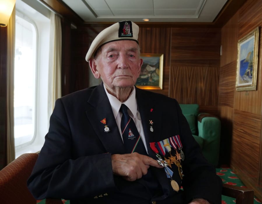 D-Day Veteran Donald Hitchcock poses for a photo wearing his campaign medals aboard the MV Boudicca as veterans return to the scene of the D-Day landings 75 years after the Allied invasion of northern France, Tuesday June 4, 2019. Hitchcock is desperate to spend D-Day commemoration on Omaha Beach with the Americans he served alongside all those years ago.