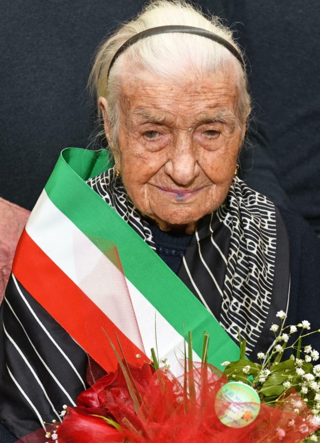 This photo taken March 19, 2018, shows Giuseppina Robucci from Poggio Imperiale, near Foggia, southern Italy. The 116-year-old Italian woman, who was the oldest person in Europe and the second-oldest in the world, has died.