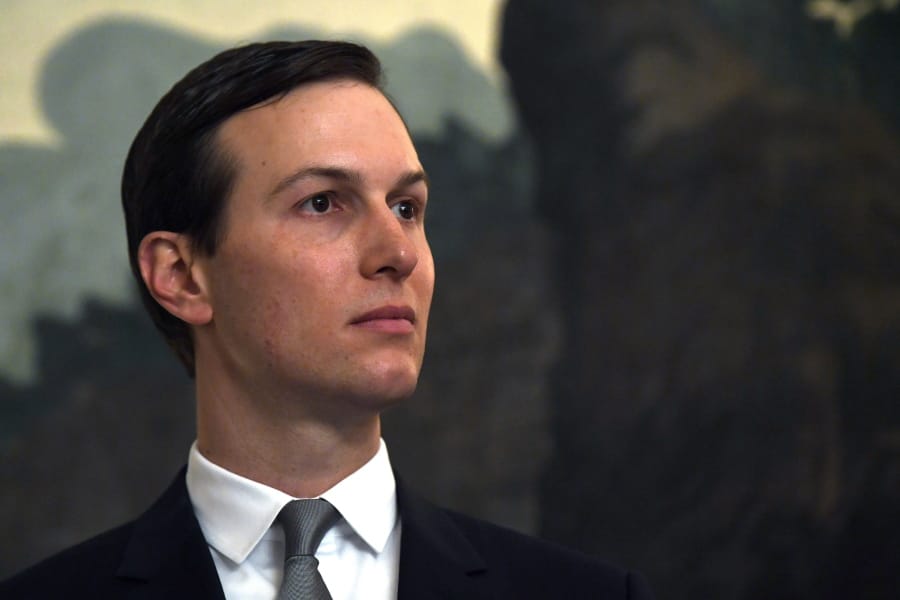 FILE - In this March 25, 2019, file photo White House adviser Jared Kushner listens during a proclamation signing with President Donald Trump and Israeli Prime Minister Benjamin Netanyahu in the Diplomatic Reception Room at the White House in Washington. Kushner will present the economic portion of his Mideast peace plan on June 25 in Bahrain, with some key players missing.