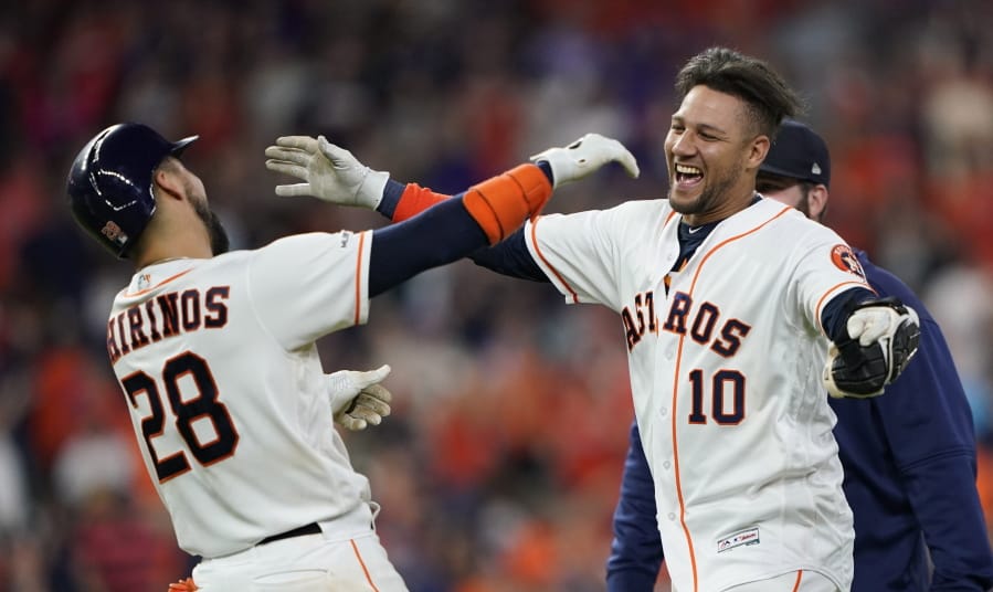 Houston Astros’ Yuli Gurriel (10) celebrates with Robinson Chirinos (28) after a baseball game against the Seattle Mariners Saturday, June 29, 2019, in Houston. Gurriel hit the game-ending RBI-double to score Michael Brantley in the 10th inning. The Astros won 6-5. (AP Photo/David J.