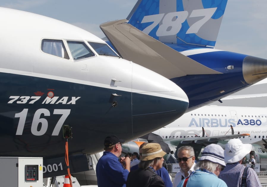 Boeing planes are displayed at the 2017 Paris Air Show. Uncertainty over a Boeing jet and apprehension about the global economy weigh heavily before next week’s show.