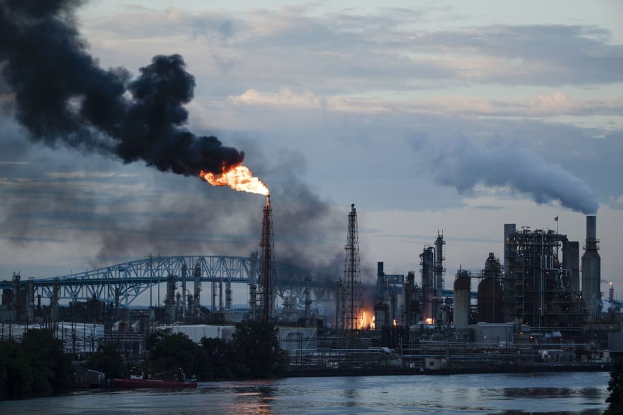 Flames and smoke emerge from the Philadelphia Energy Solutions Refining Complex in Philadelphia, Friday, June 21, 2019.