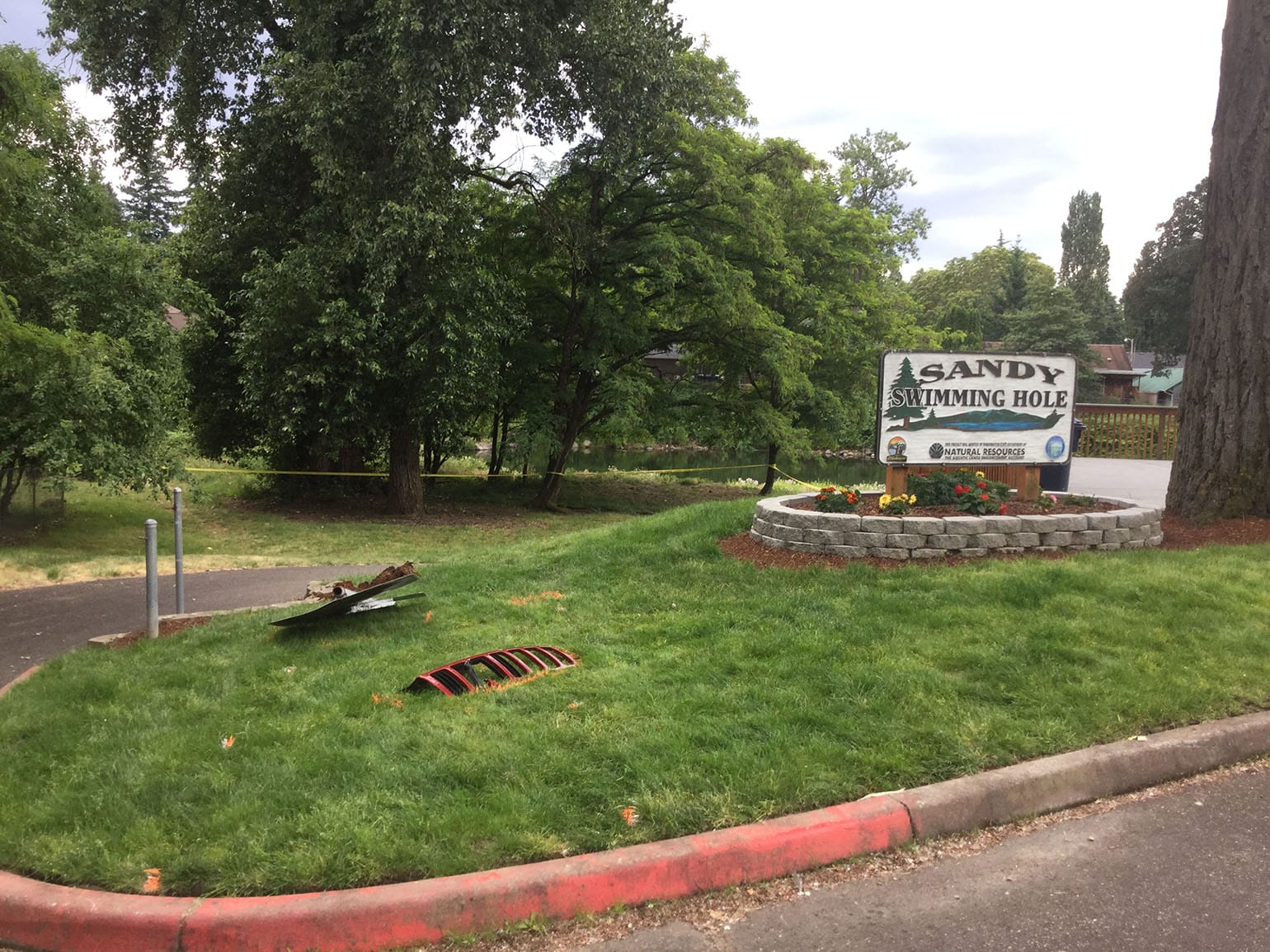Two people died Tuesday afternoon after a Jeep tore through Sandy Swimming Hole Park in Washougal.