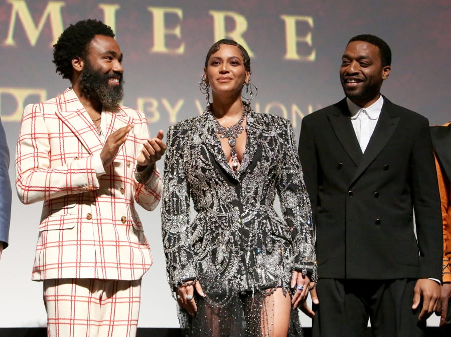Donald Glover, from left, Beyoncé, and Chiwetel Ejiofor attend the world premiere of Disney’s “The Lion King” July 9 at the Dolby Theatre in Hollywood, Calif.