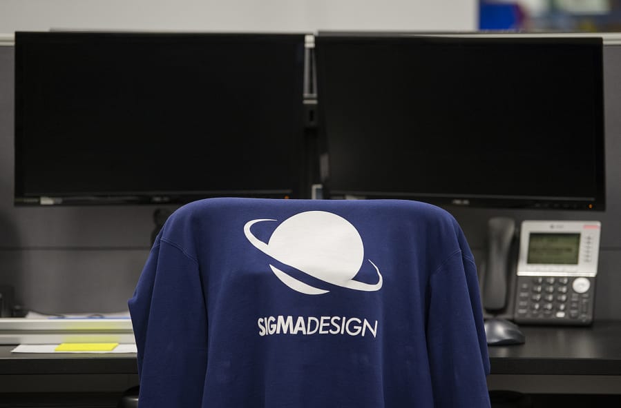 A company sweatshirt is seen on the chair of an employee at Sigma Design.