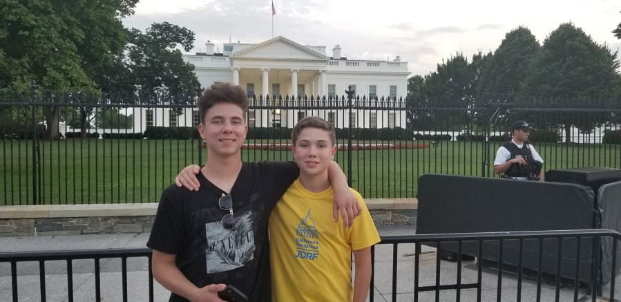 Anthony Ross, left, and his brother Austin pose outside the White House. The brothers have Type 1 diabetes and have advocated for patients at Children’s Congress in Washington, D.C.