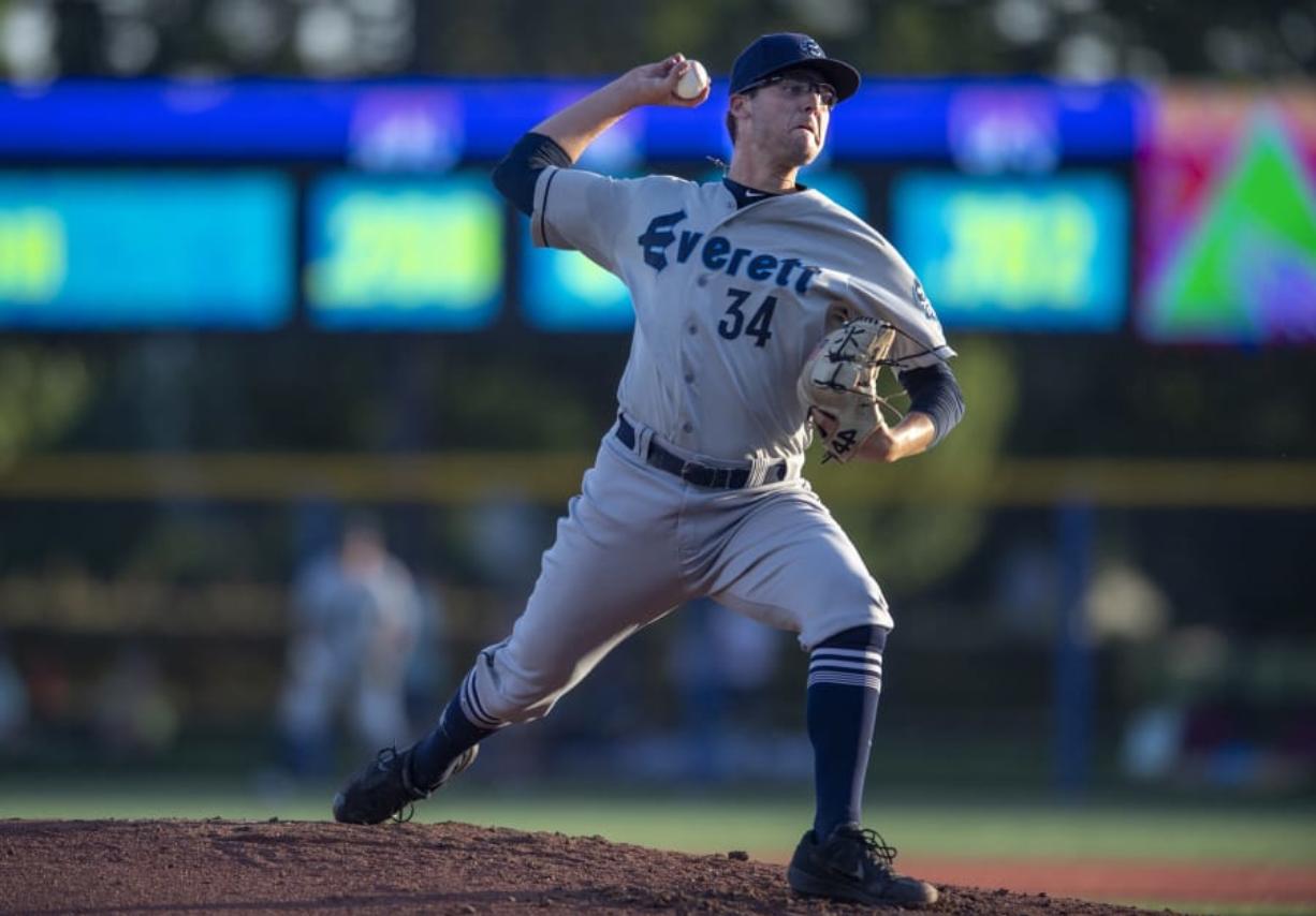 AquaSoxís Damon Casetta-Stubbs (34) delivers a pitch in the bottom of the third inning against the Hillsboro Hops at Ron Tonkin Field on Tuesday evening, July 30, 2019.
