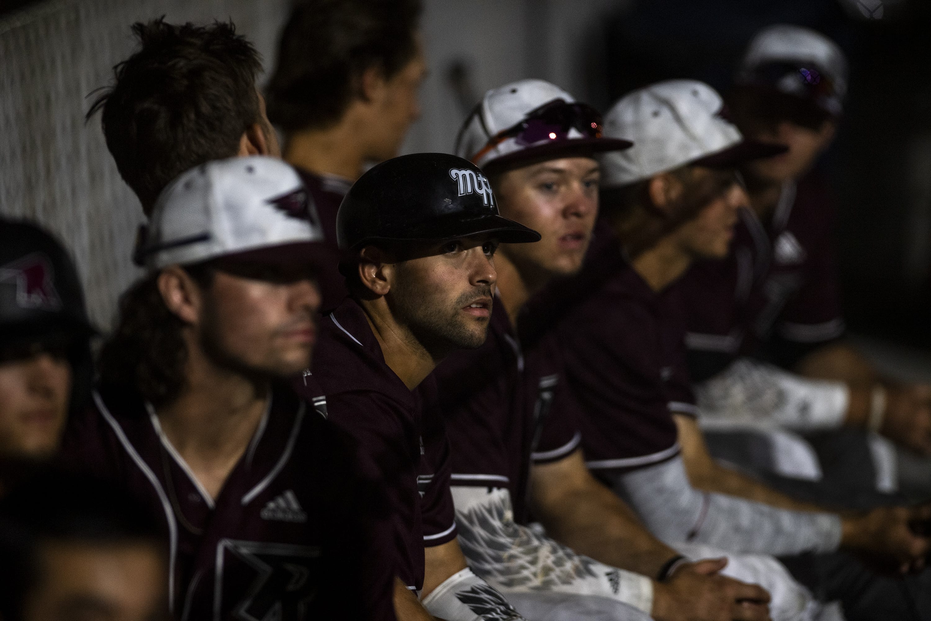 The Raptors watch the game from the dugout during Tuesday nightÕs game against the Bells at the Ridgefield Outdoor Recreation Complex on July 30, 2019.