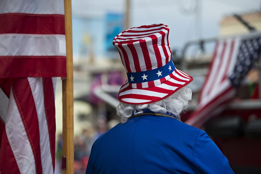 Uncle Sam, otherwise known as Ed Martin of Ridgefield, gets into the Fourth of July spirit while watching Ridgefield’s annual parade from his spot along Pioneer Street on July 4, 2018.