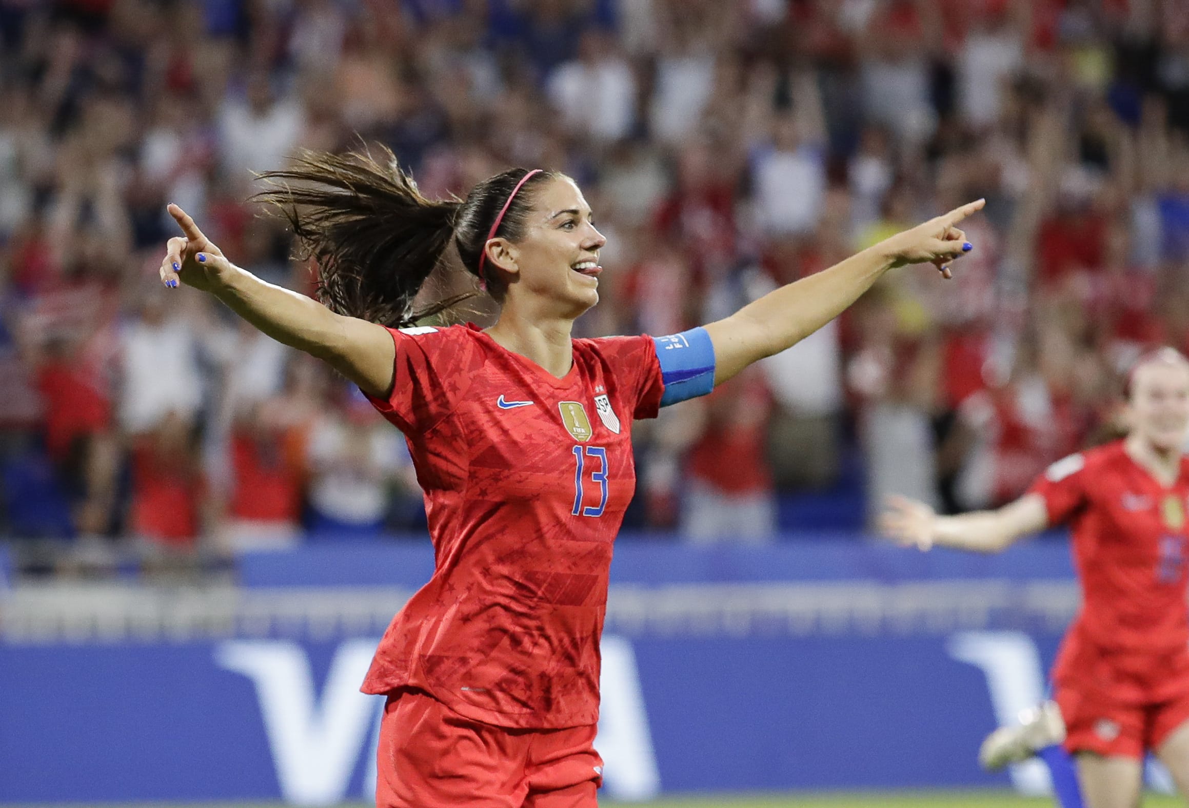 United States' Alex Morgan celebrates after scoring her side's second goal during the Women's World Cup semifinal soccer match between England and the United States, at the Stade de Lyon, outside Lyon, France, Tuesday, July 2, 2019.
