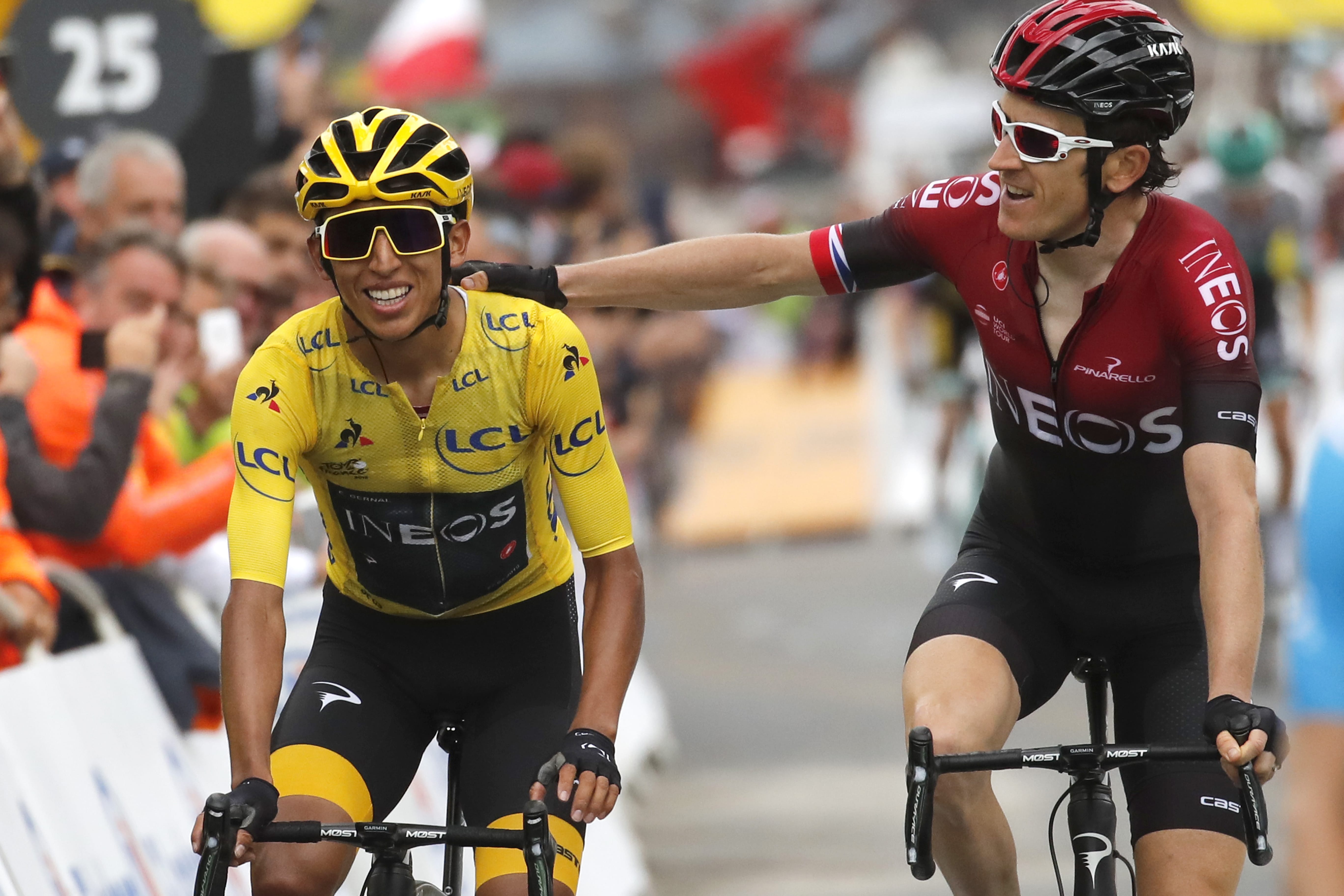 Britain's Geraint Thomas, right, congratulates Colombia's Egan Bernal wearing the overall leader's yellow jersey as they crosses the finish line of the 20th stage of the Tour de France cycling race over 59,5 kilometers (36,97 miles) with start in Albertville and finish in Val Thorens, France, Saturday, July 27, 2019.