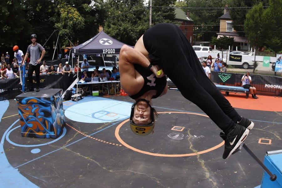 Harry White, of Orillia, Canada, performs in Pogopalooza, The World Championships of Pogo in Wilkinsburg, Pa., Saturday, July 20, 2019. White is the only Canadian in the two day competition. (AP Photo/Gene J.