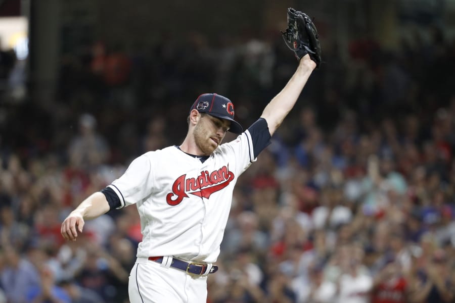 American League pitcher Shane Bieber, of the Cleveland Indians, reacts after striking out National League’s Ronald Acuna Jr., of the Atlanta Braves, to end the top of the fifth inning of the MLB baseball All-Star Game, Tuesday, July 9, 2019, in Cleveland.