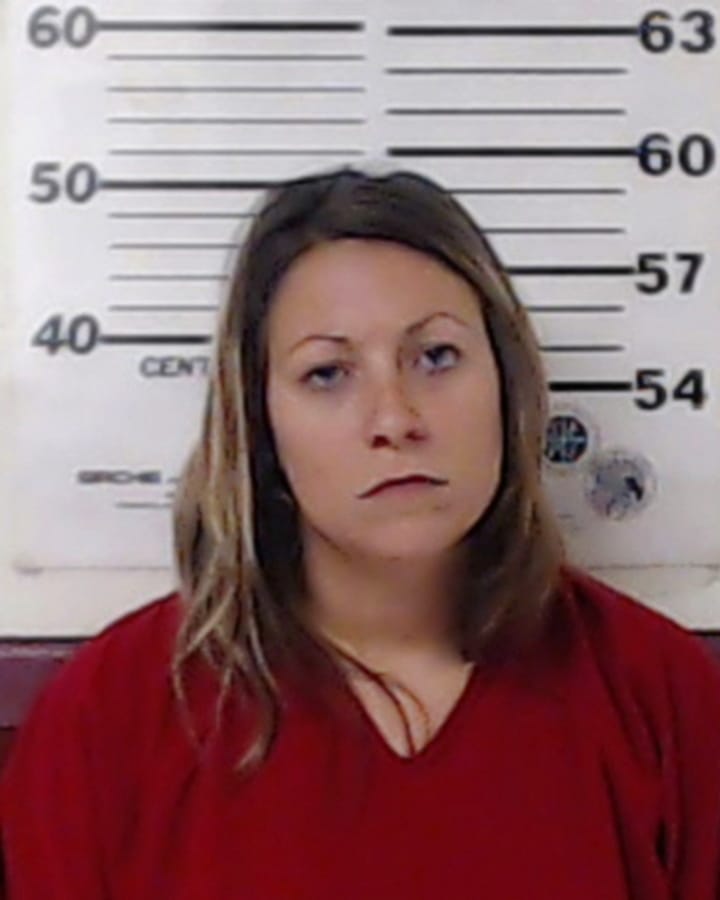 FILE - This Nov. 2, 2017 file booking photo released by Henderson County Sheriff’s Office in Athens, Texas shows Sarah Nicole Henderson. Henderson has agreed to a plea deal that will result in a life sentence for fatally shooting her two young daughters in 2017. Prosecutors declined to pursue the death penalty against 31-year-old Henderson in exchange for her guilty plea Wednesday, July 17, 2019, on two counts of capital murder in the deaths of her 7- and 5-year-old daughters.